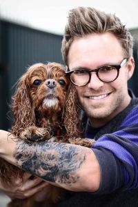 Seth with Buster, the first underwater dog.
